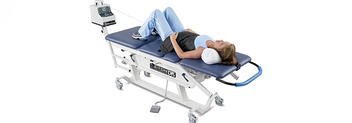 Chronic Pain Danville VA Lady On Spinal Decompression Table